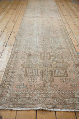 Distressed vintage Karaja runner, geometric hook and latch patterns in pale blush and sand tones.