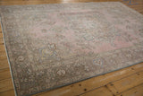 Distressed Tabriz border and corner with intricate floral arabesques and pale pink field.