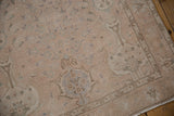 Evenly worn knot heads on the pale pink field of a distressed Turkish Sivas rug.