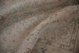 Detail of the distressed Sivas rug's texture with even wear down to the knot heads.