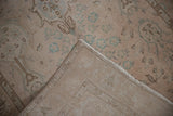 A folded corner of the vintage Sivas rug reveals its clean, tightly woven hand-knotted foundation.