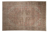 Vintage distressed Tabriz rug, central medallion, faded rose, sand, and brown floral design.