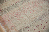 Distressed vintage Turkish Sivas carpet section, low pile, abrashed field, pink florals.