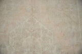 Soft, even pile of a vintage distressed Oushak carpet showing hand-knotted texture.