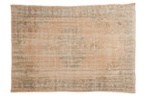 Vintage distressed Oushak carpet with faded apricot and green floral medallion pattern, 5'7