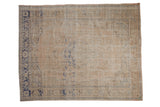 Distressed Vintage Oushak carpet, faded cream and cobalt geometric floral patterns, textural pile.