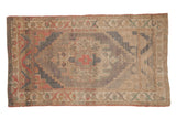 Distressed Oushak rug, faded floral medallion, stepped corners, red, blue, green, ivory field.