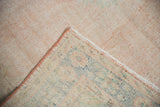 Distressed Oushak pile in pale pink and ivory, with hand-knotted foundation and selvage.