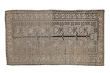 Vintage Distressed Oushak rug with tree of life motif in muted silver, beige, and charcoal.