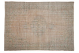Distressed vintage Oushak rug with cream field and seafoam green medallion, 6'3