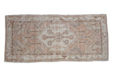 Vintage Distressed Oushak rug runner with floral medallion, ivory and dusty melon, 2'6