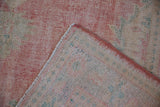 Vintage distressed Oushak carpet revealing worn pile to foundation and intact side selvage.
