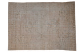 Distressed vintage Oushak carpet in muted cream and beige with faded medallion, 7'5