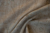 Distressed Oushak rug pile texture with visible knot heads, in cream, ivory, and faint green.