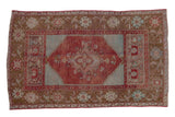Distressed Anatolian rug, cherry red medallion, turquoise field, bronze floral border, 3'5