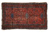 Hand-knotted Vintage Lilihan rug, raspberry red field, triple sapphire blue medallions, botanical motifs.