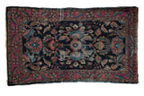 Vintage hand-knotted Lilihan rug with navy field, shadow floral medallion, and raspberry border. 3'10