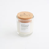 White Eucalyptus Lavender soy candle, showing label and detailed compass cork lid.
