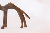 Patinaed bronze hind legs and tail of a vintage African camel casting.