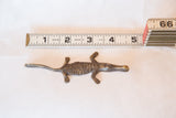 Vintage bronze crocodile sculpture measured with a ruler showing its 4.5-inch length.