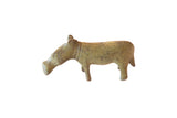Vintage African bronze hippo sculpture featuring a large snout and an aged, rustic patina.