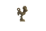 Vintage African rooster pendant in dark bronze, showing handmade details and natural patina.