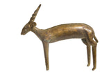 Vintage African bronze antelope sculpture with large spiral horns and imperfect front feet.