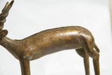 Vintage African bronze antelope sculpture's body with rich patina and textured spine.