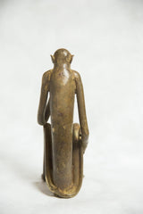 Back of the vintage bronze monkey sculpture, showing its slender form and textured patina.