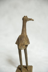 Textured bronze back and scaled neck detail of the African fishing bird sculpture.