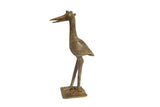 Stylized vintage African fishing bird sculpture in bronze, featuring a triple horn and aged patina.