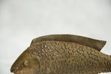 Vintage African bronze fish sculpture, with textured scales and ribbed dorsal fin.