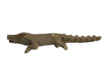 Large vintage African bronze crocodile sculpture with a low, textured body and aged patina.