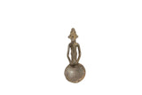 Vintage African bronze Ashanti gold weight spoon with a stylized female figure handle.