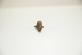 Side profile of the vintage bronze ring's textured, crosshatched band.
