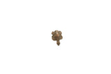 Vintage African bronze ring cast in the shape of a turtle, showing its textured patina.