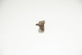 A profile view of the vintage African bronze rooster ring showing its thick, textured band.