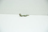 Vintage bronze crocodile charm with a detailed, textured body and a curled loop tail.