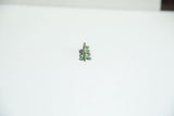 Front view of the patinated bronze chameleon charm showing its narrow, stylized shape.