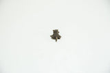 African bronze frog charm, detailed view of the textured back with dark patina.