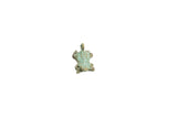 Vintage African bronze armadillo charm with a textured shell and green patina.