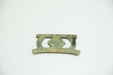 Reverse view of the vintage African bronze buckle showing its hook closure and patina.