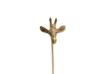 Detailed view of the sculpted bronze giraffe head, showing its aged patina and facial features.
