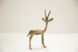Vintage African bronze gazelle collectible, showing its rich aged patina.