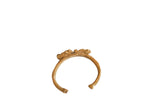 Vintage open cuff bracelet featuring two chameleons with a textured, golden patina.