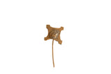 Vintage bronze pin with a textured, four-point head and a central egg detail.