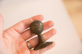 Tritcraf bronze collectible's dimpled ball, stem, and base with rich aged patina.