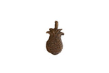 Vintage African bronze pendant in a pineapple shape with a textured, dark patina.