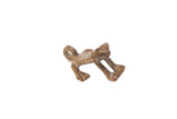A stylized vintage African bronze frog pendant with a dusty, textured patina.