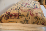 Antique Persian Kerman rug pillow features mythological figures in deep blue and maroon tones.